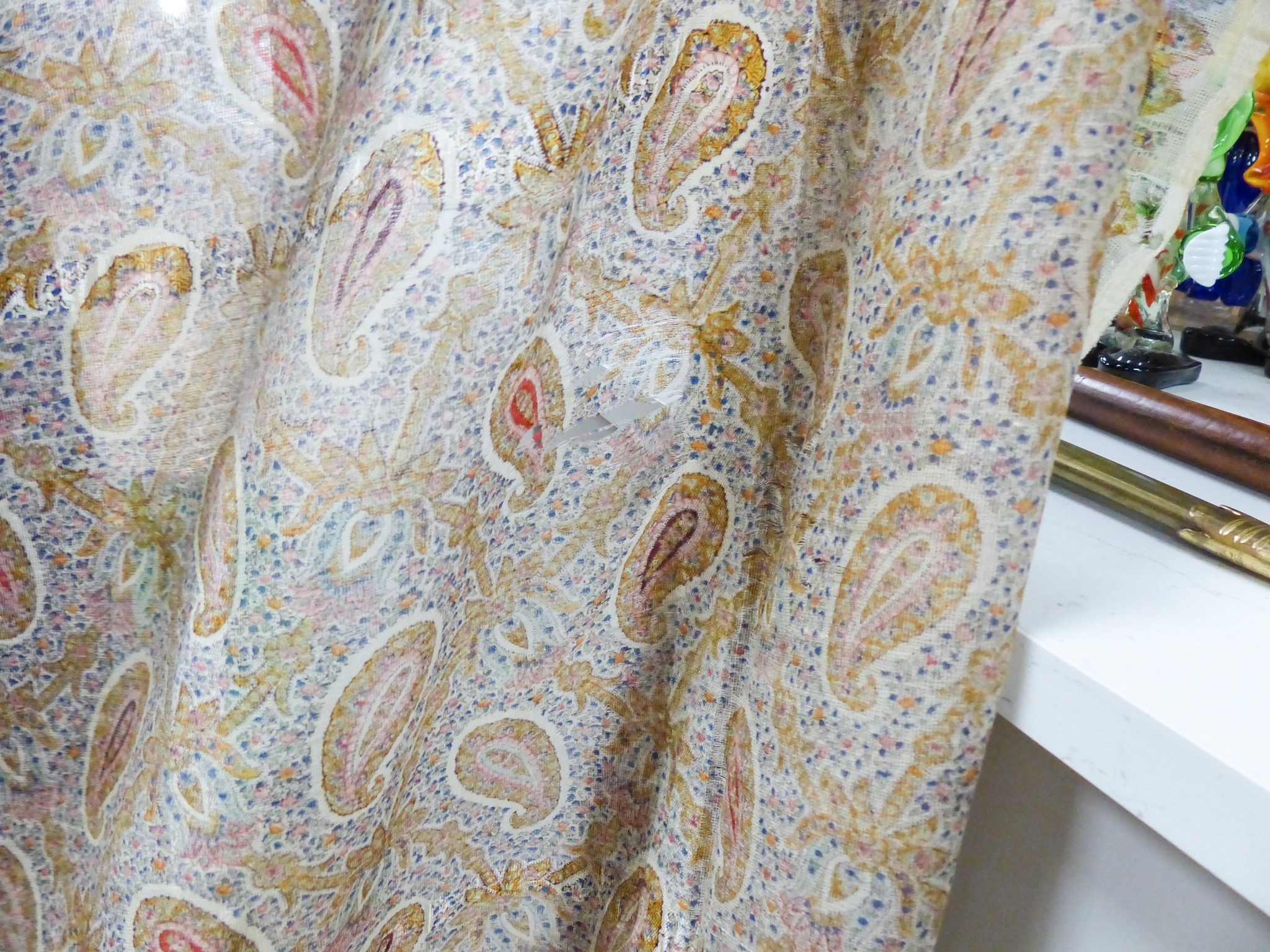 A Paisley pattern silk shaw (damaged) together with two Kelim woven bags (3)